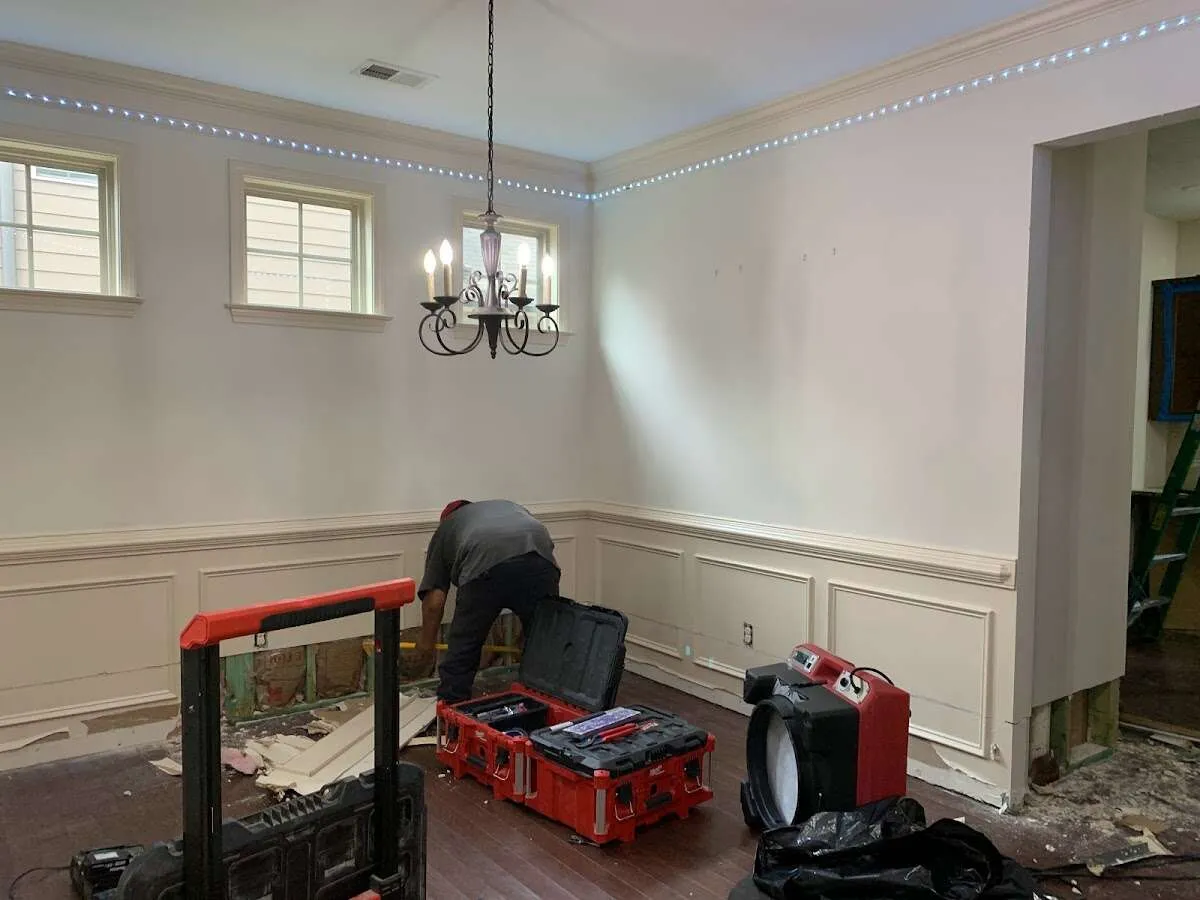 Restoration technician with professional equipment in Scarborough